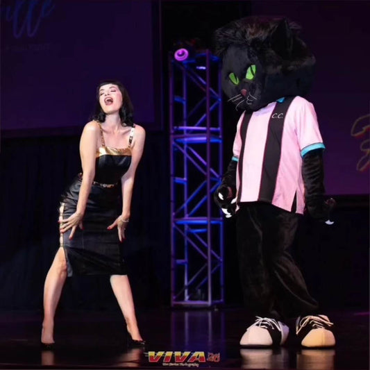 Pinup model Bernie Dexter modeling a custom one of a kind black vegan leather dress by Hollyville in the Viva Las Vegas Rockabilly Weekend #26 Fashion Show 2023 (Photo: Tim Hunter Photography)