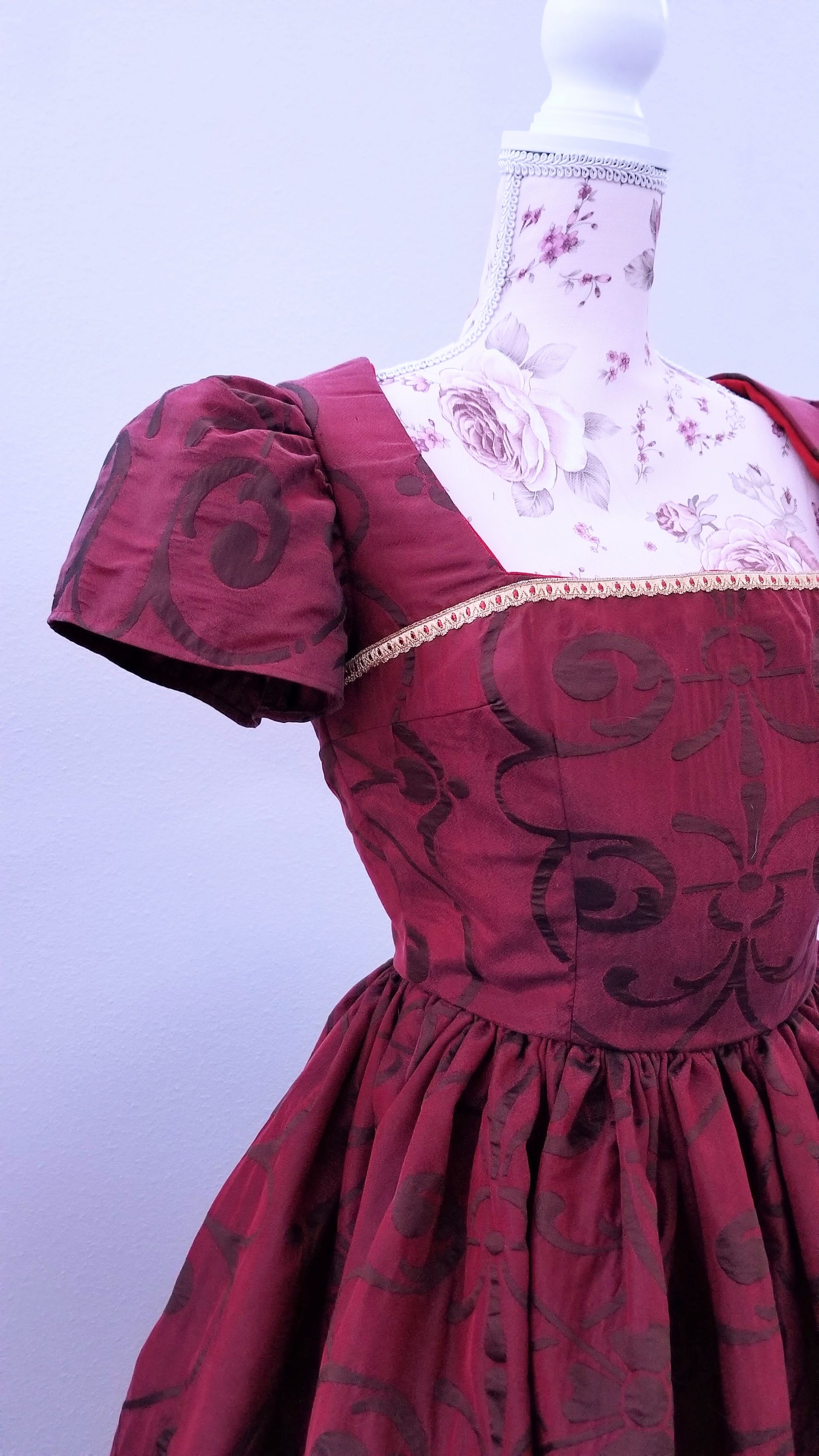 This rich in burgundy color is designed as a one-of-a-kind dress made personally by Hollyville shop owner, Pamela Marie.