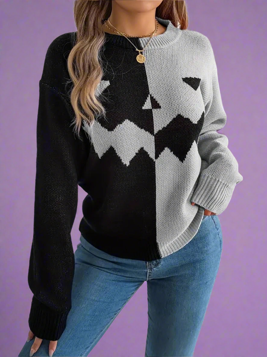 Jack O Lantern Halloween Pumpkin Sweater in a black and grey colorblock for women