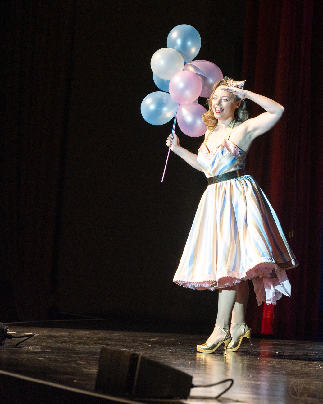 Pinup model and fashion designer, Pamela Marie wearing one of her designs in the VIVA Las Vegas Rockabilly Weekend Fashion Show for Hollyville | Photo by Craig Maxfield