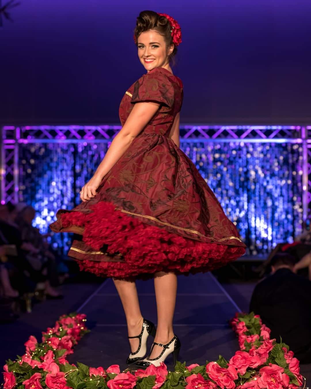 This rich in burgundy color is designed as a one-of-a-kind dress made personally by Hollyville shop owner, Pamela Marie.