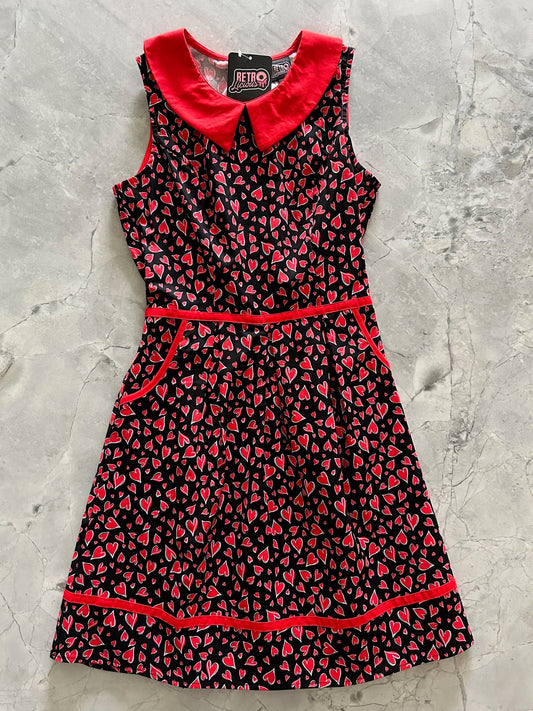 1960's inspired vintage dress with red heart pattern by Retrolicious. Perfect for Valentine's Day!