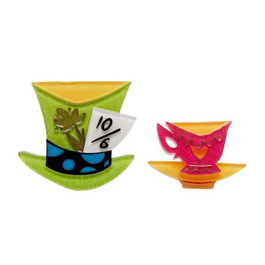 Alice's Wonderland collaboration with Kitschy Witch, this hand-assembled Mad Hatter's hat and teacup double brooch uses a colorful combination of resins and features hand-painted details.

"The perfect occasion for a riddle and a spot of tea."