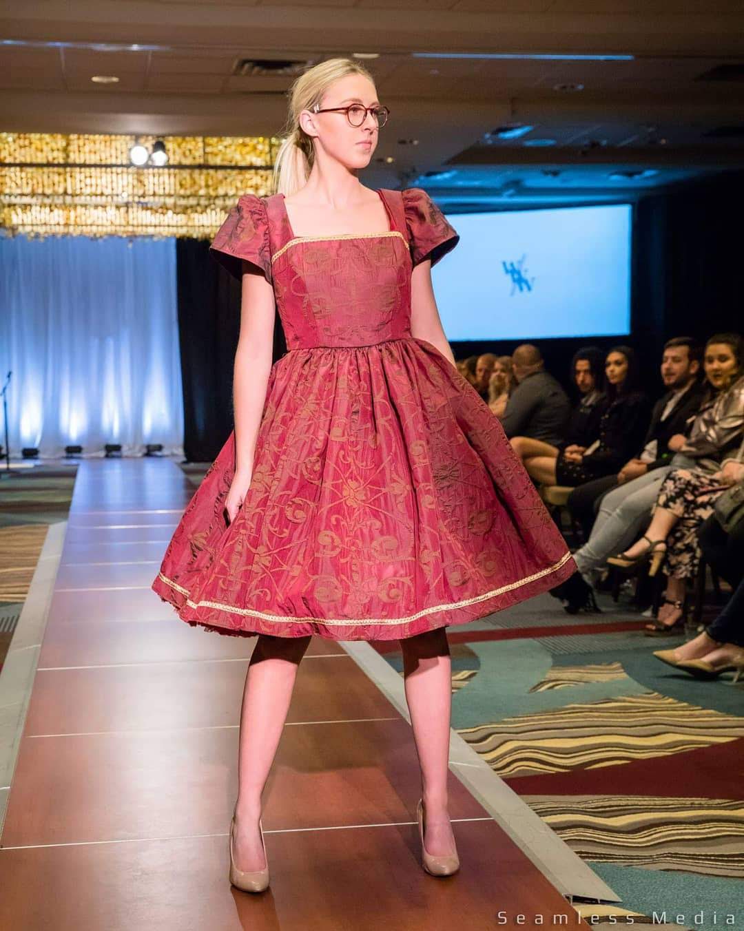 This rich in burgundy color is designed as a one-of-a-kind dress made personally by Hollyville shop owner, Pamela Marie.